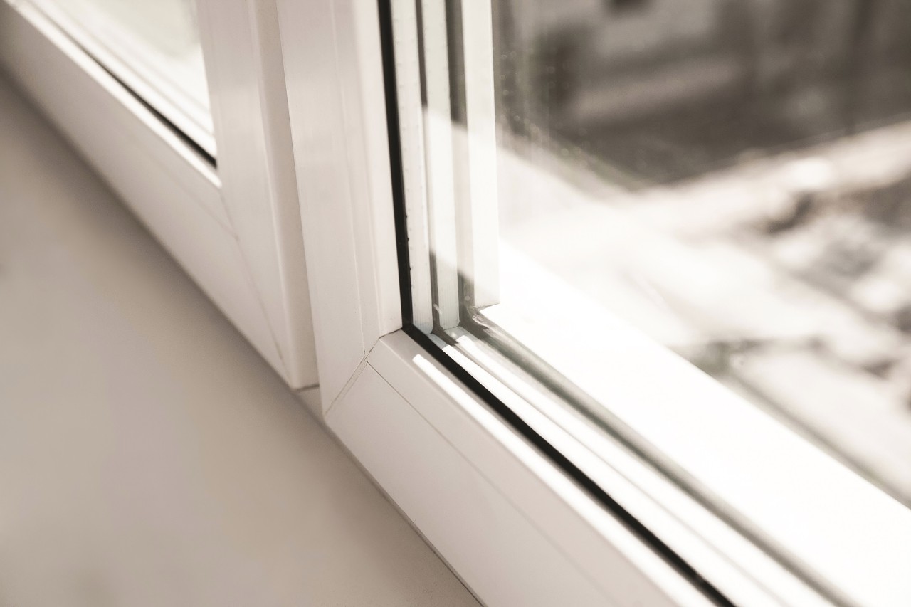A window with double glazing and a warm edge spacer Filename and title: Warm edge spacer in a window.